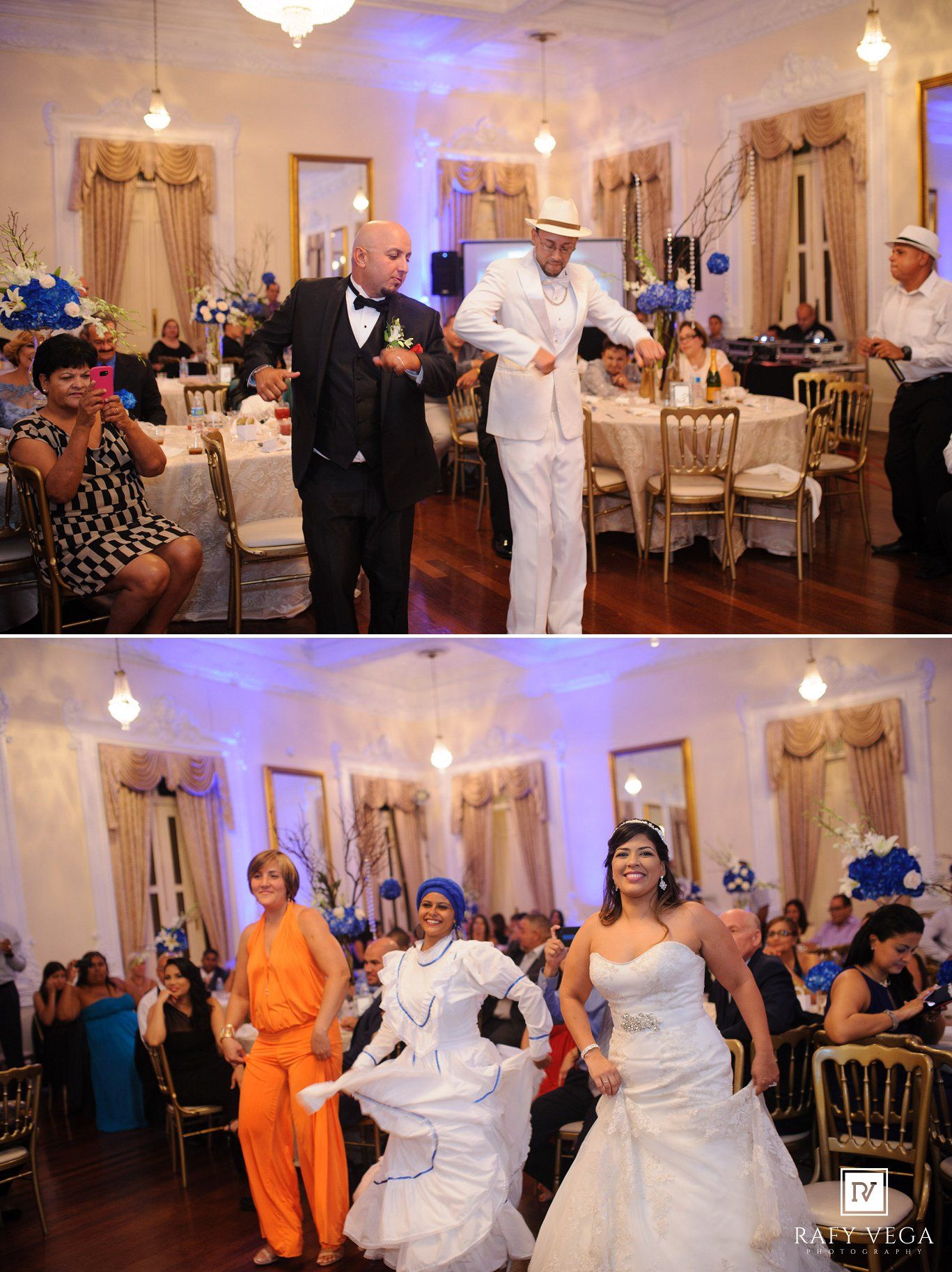 Wedding reception dancers in colorful attire perform lively cultural dance for guests in elegant ballroom.