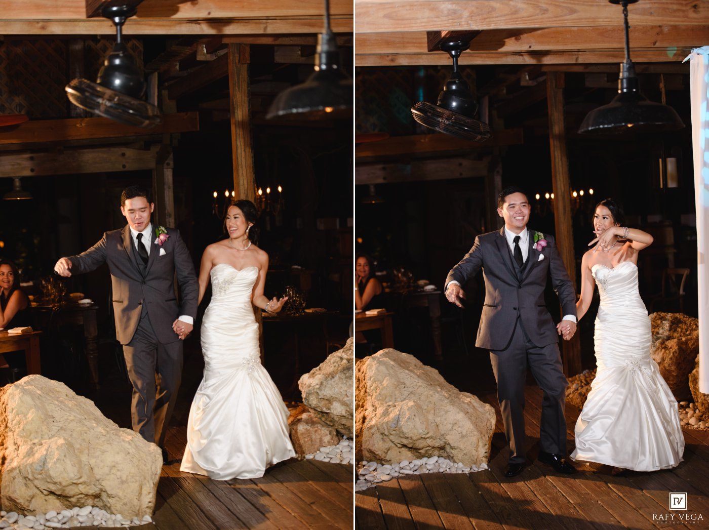 Bride and groom make their grand entrance at rustic wedding reception venue.