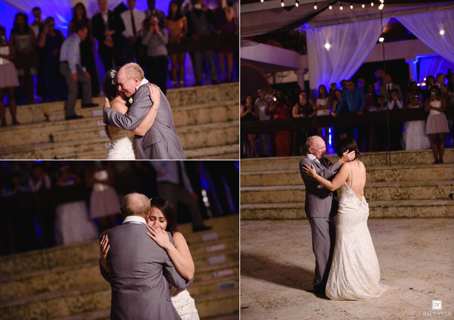 Wedding reception first dance moments captured with guests watching under blue uplighting.