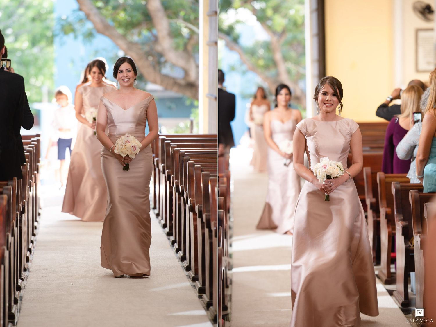 Bridesmaids in blush pink satin gowns walk down a church aisle carrying white bouquets during a wedding ceremony.