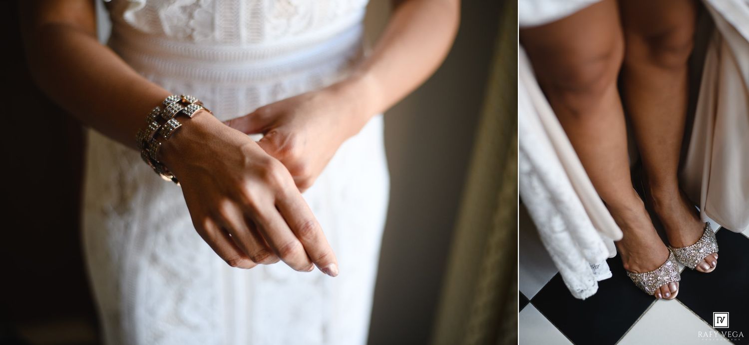 Bride in white lace dress adjusting bracelet, with close-up of sparkling wedding heels below.