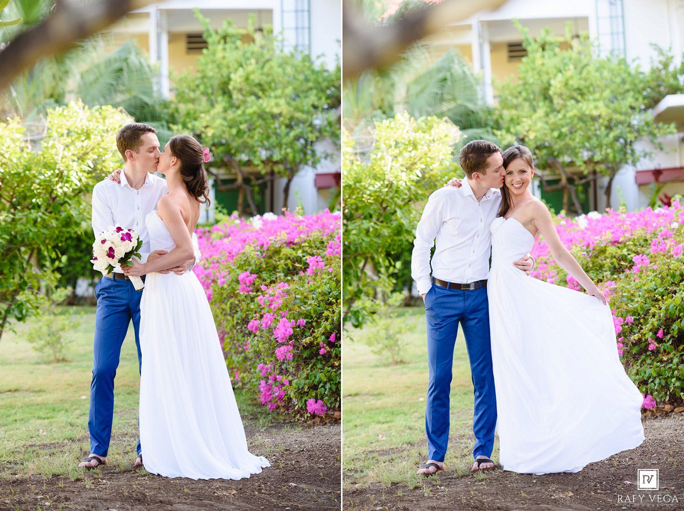 Bride and groom share a romantic kiss outdoors surrounded by vibrant pink flowers on their wedding day.