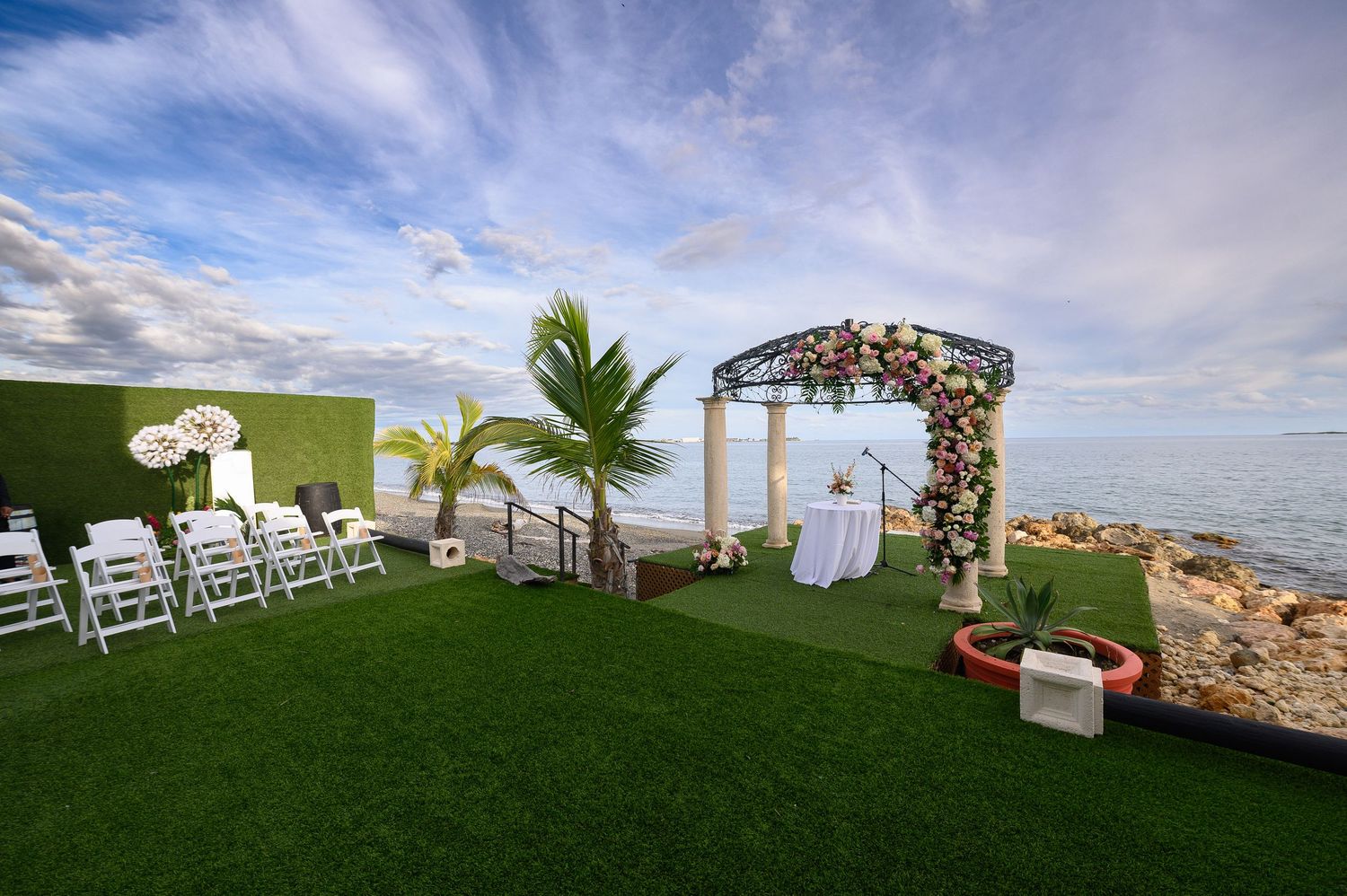 Outdoor wedding ceremony at Ocean View at Porto Caribe in Ponce, Puerto Rico