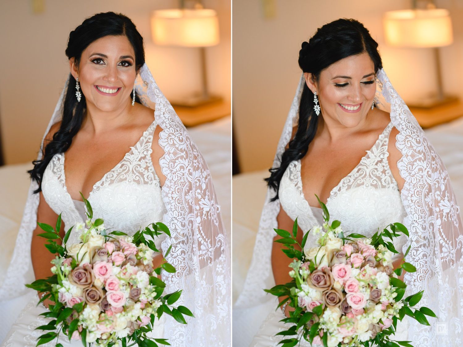 Smiling bride in lace wedding dress and veil holding pink and white floral bouquet in a bright indoor setting.