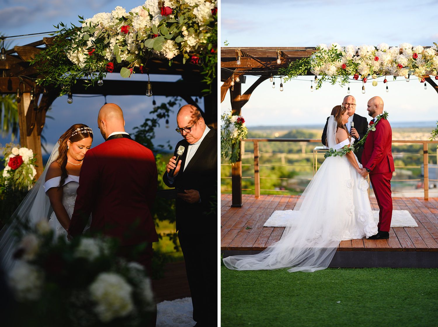 Outdoor wedding ceremony under floral arbor, bride in white gown and groom in red suit exchanging vows on wooden deck.