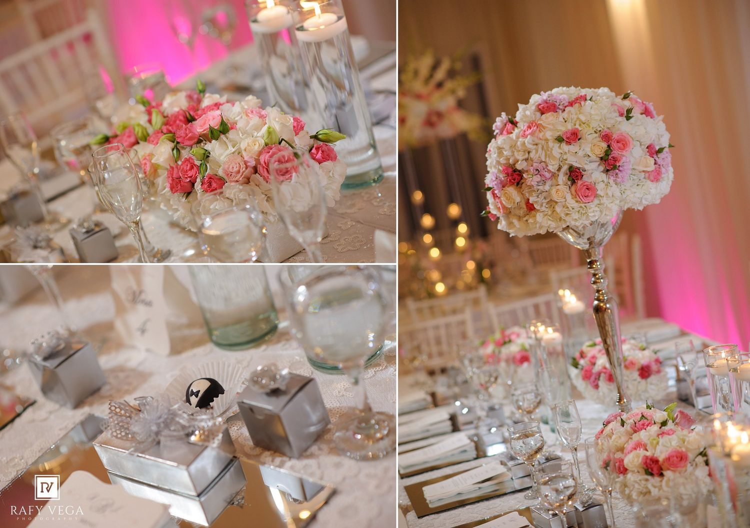 Elegant wedding reception tablescape with pink and white floral centerpieces, crystal accents, and candlelight in a ballroom.