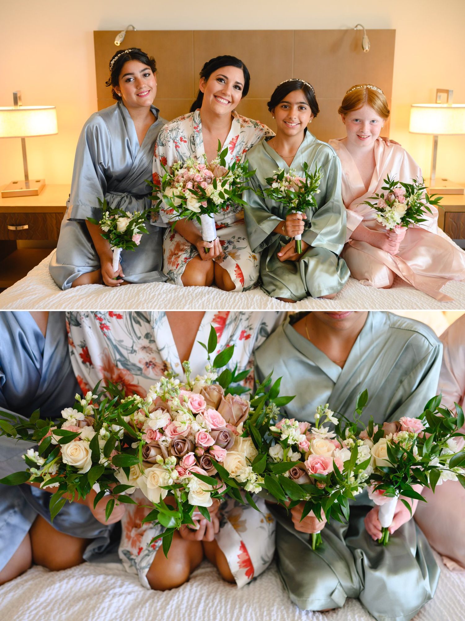 Bridesmaids and flower girls in satin robes holding pink and white floral bouquets while sitting on a bed.