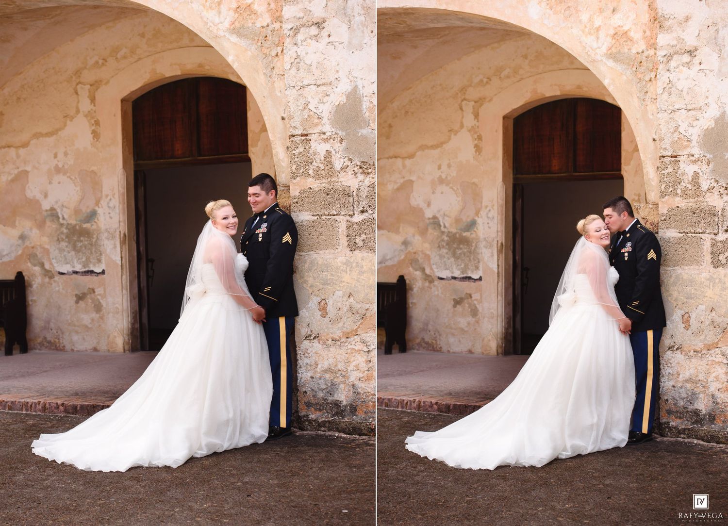 Military groom and bride pose together against a rustic stone wall in wedding attire.