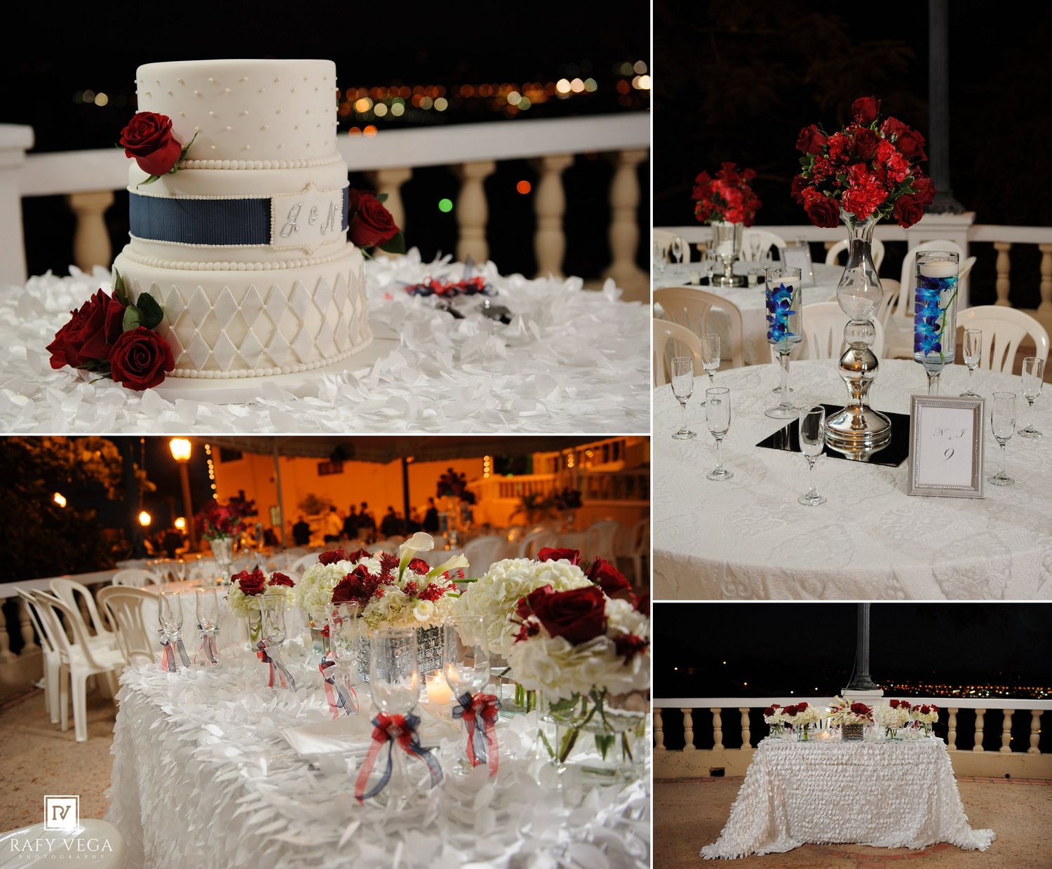 Elegant wedding reception featuring a white tiered cake with navy ribbon, red floral centerpieces, and decorated tables at an outdoor venue.
