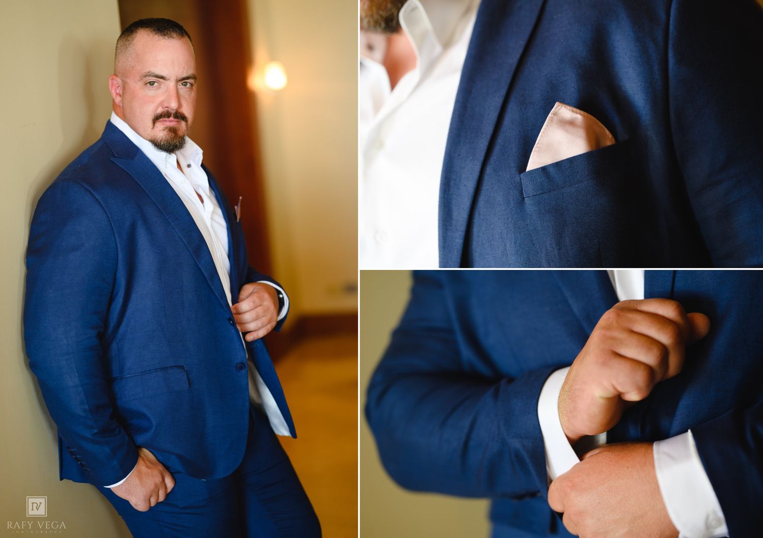 Man in navy blue suit with pocket square posing, with close-up details of cufflinks and jacket lapel.