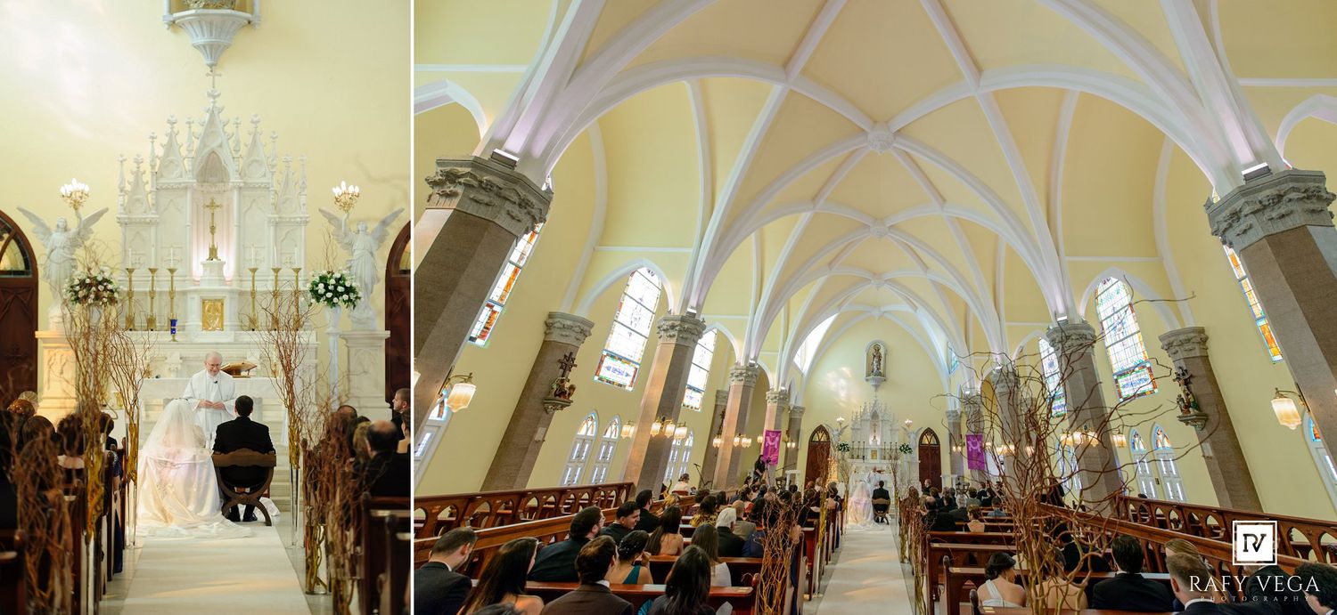 Elegant white church interior with vaulted ceilings, ornate altar, wooden pews, and stained glass windows during a wedding ceremony.