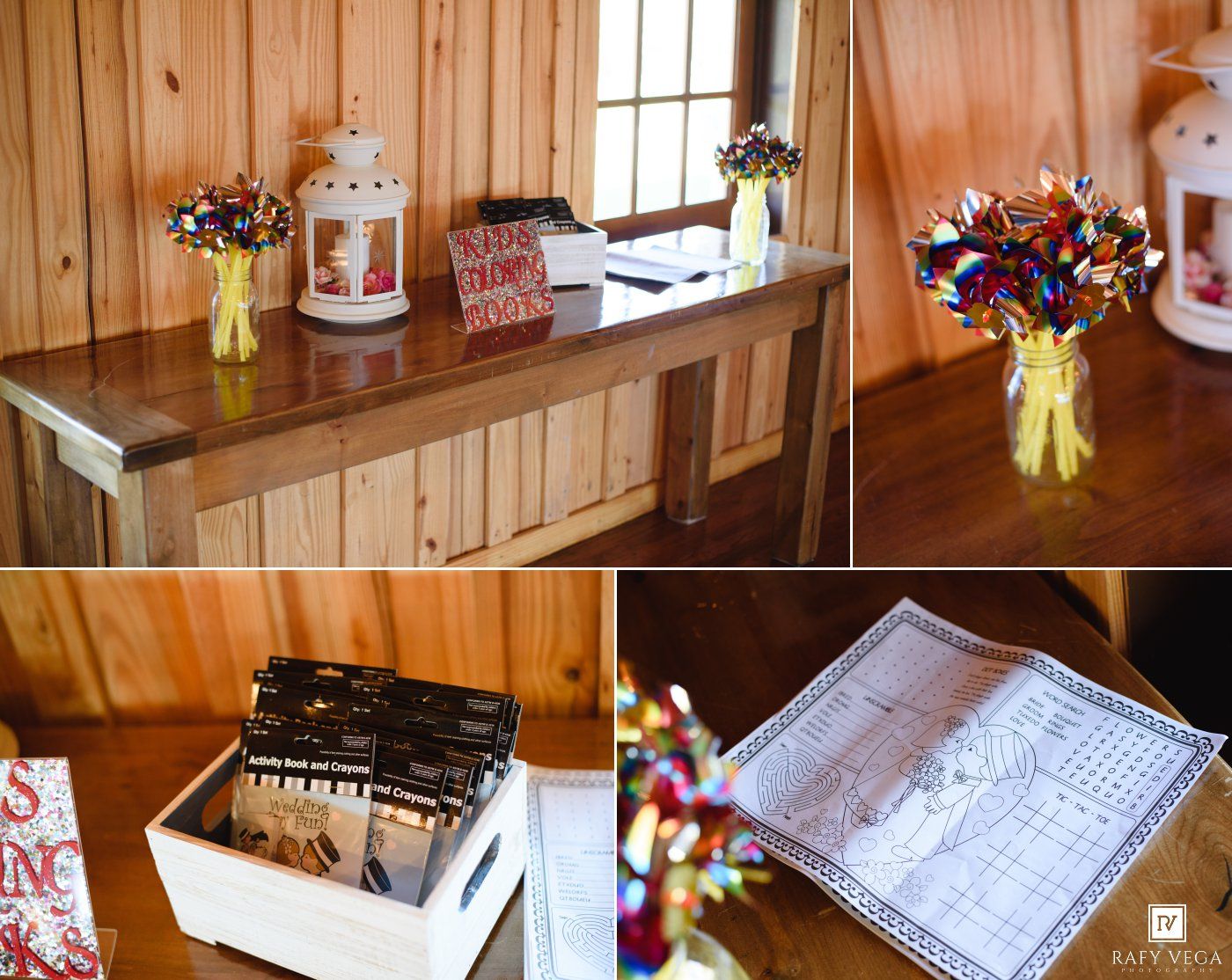Rustic wooden table with colorful wildflower bouquets in mason jars, lanterns, and decorative items at a country wedding venue.