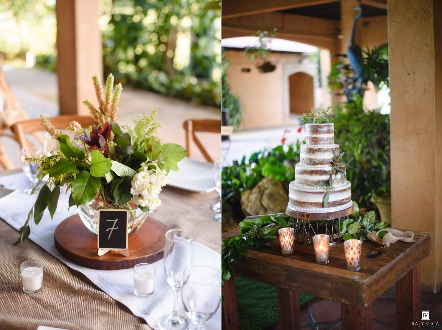 Rustic wedding reception table with floral centerpiece and a naked tiered cake displayed on a wooden table with greenery.