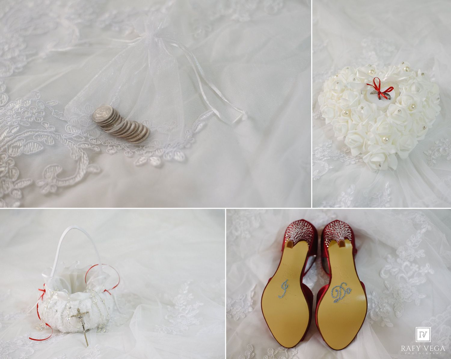 Elegant wedding flat lay featuring bridal shoes, a floral ring pillow, flower girl basket, and coins on white lace fabric.