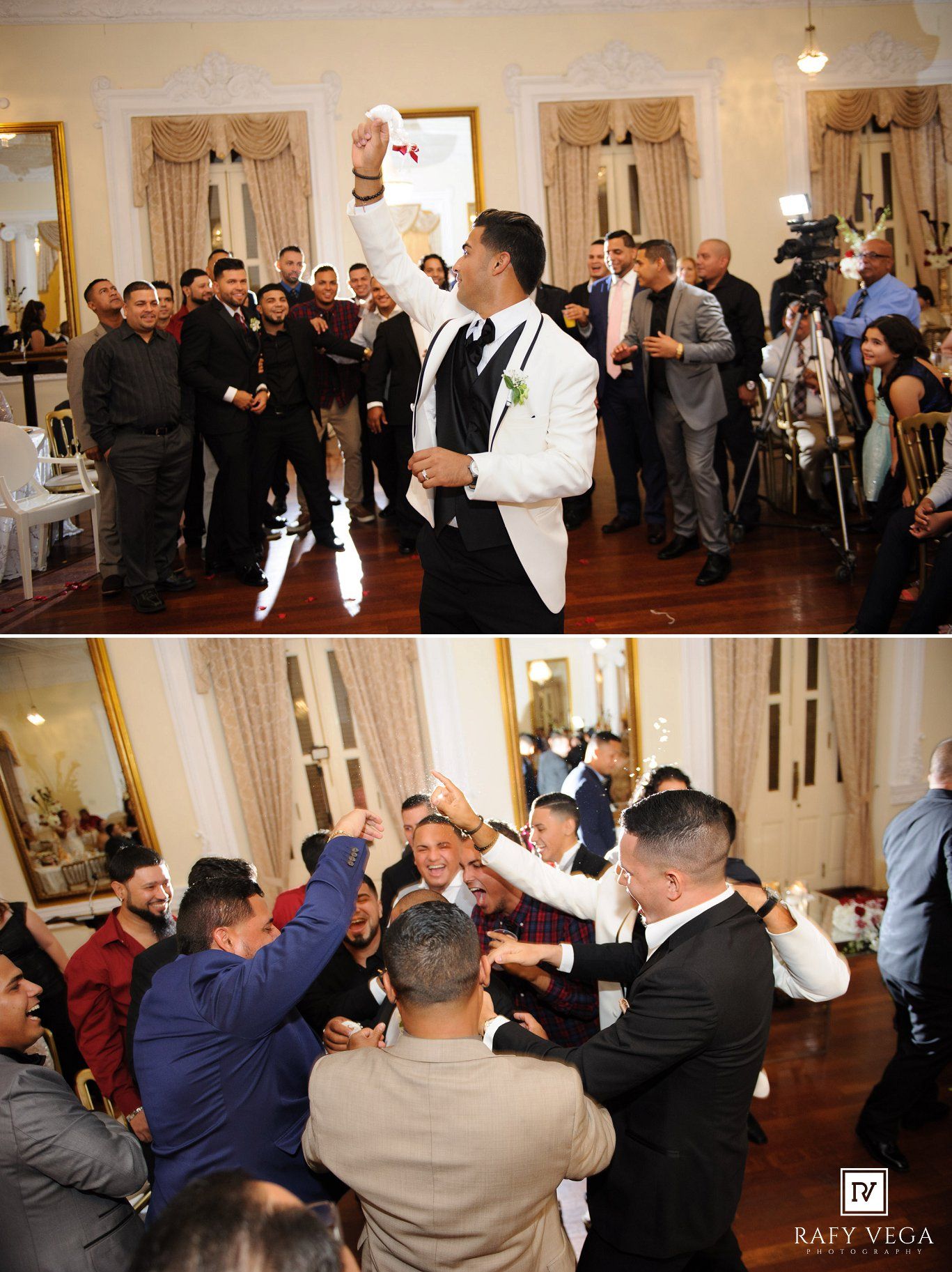 Groom in white tuxedo celebrates with guests on dance floor at elegant wedding reception.
