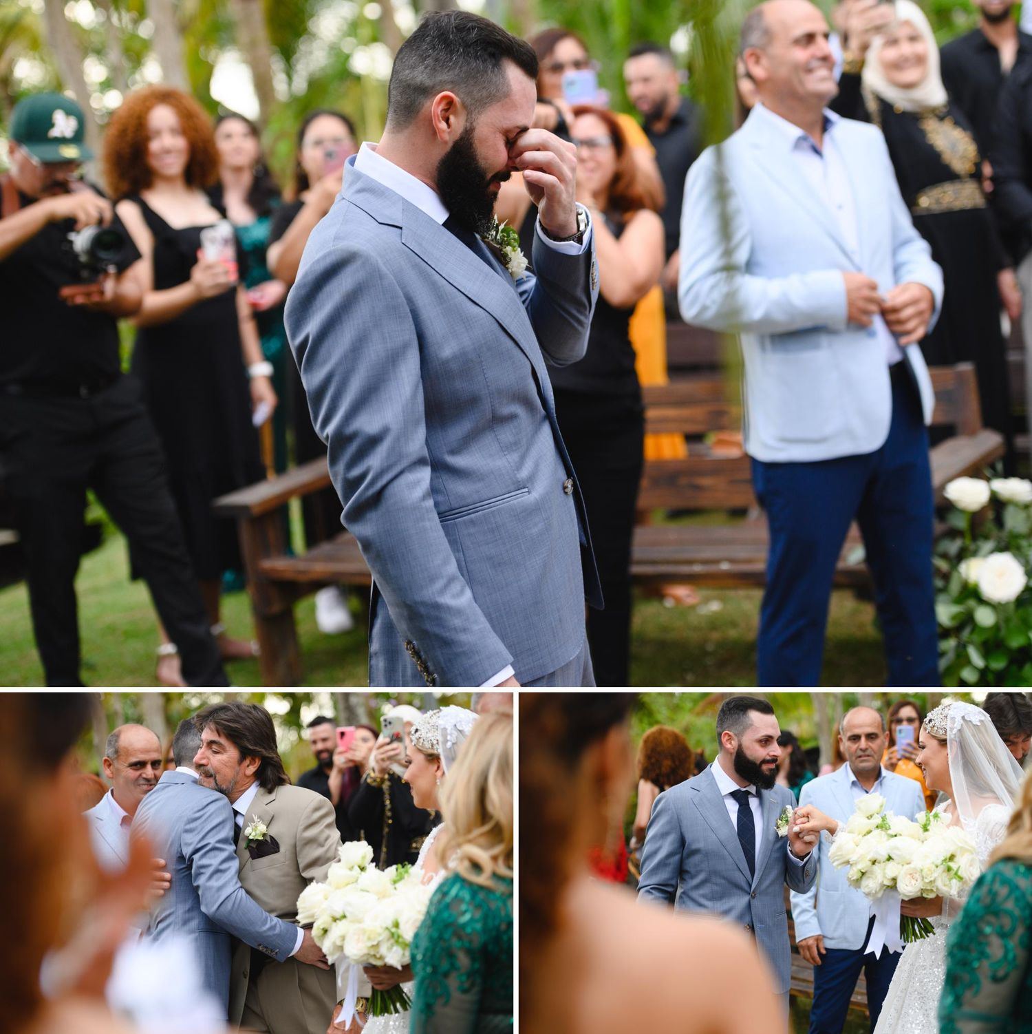 Emotional groom in gray suit wipes tears during outdoor wedding ceremony with guests seated on wooden benches.