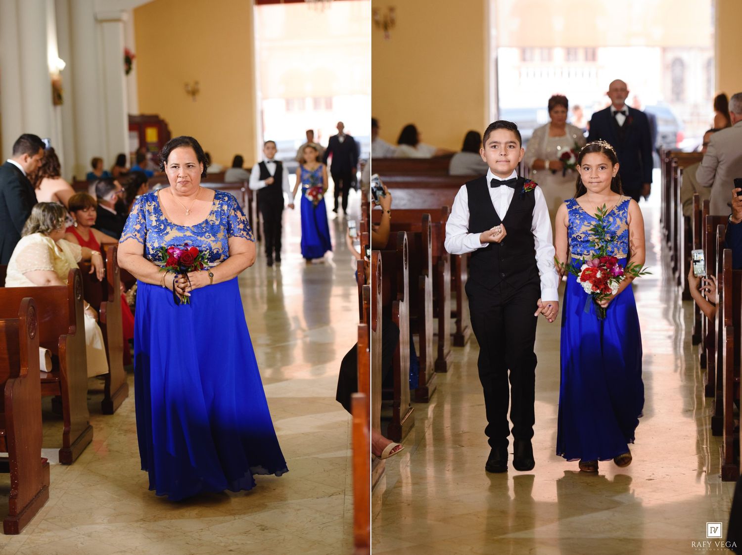 Wedding procession in a church with guests in royal blue gowns and a young boy in a black vest walking the aisle.