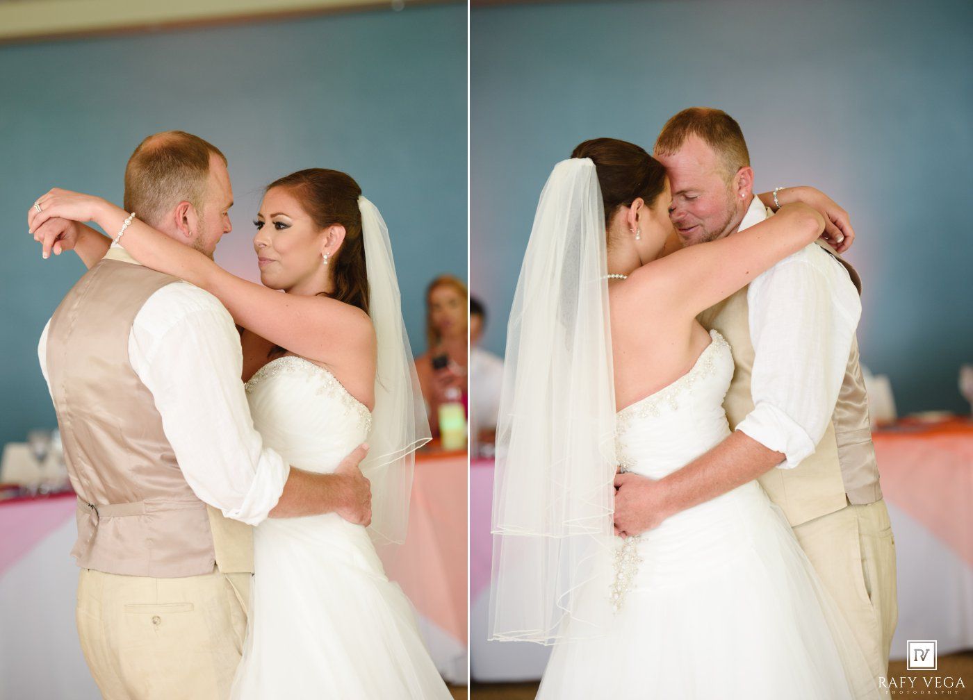 Bride and groom share their first dance, embracing tenderly in a softly lit wedding reception venue.