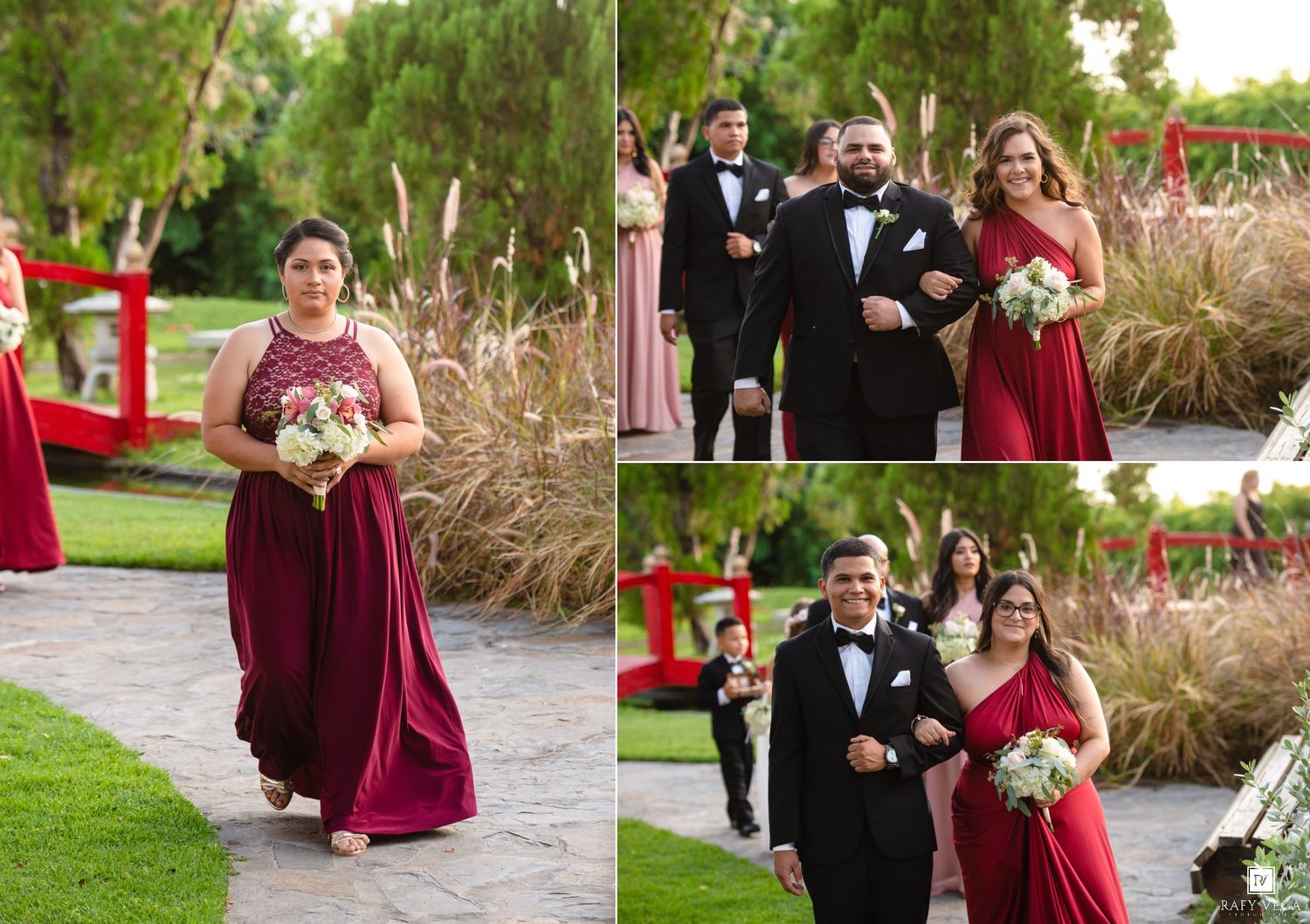 Bridesmaids in burgundy dresses walk with groomsmen in tuxedos along a garden path at an outdoor wedding ceremony.
