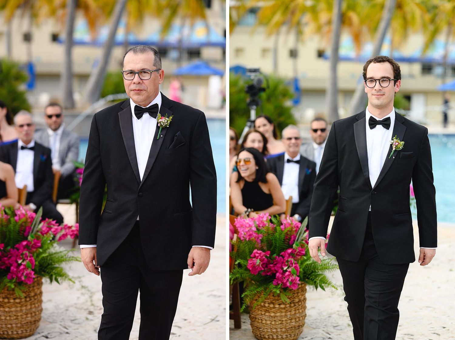 Two men in black tuxedos with boutonnieres walk on a sandy beach during an outdoor wedding ceremony.