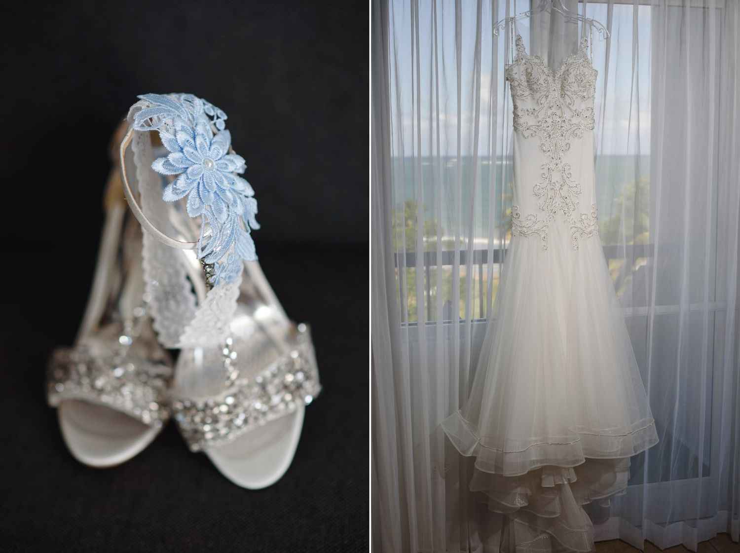 Elegant bridal heels with crystal embellishments and blue floral detail beside a beaded mermaid wedding gown hanging by a window.