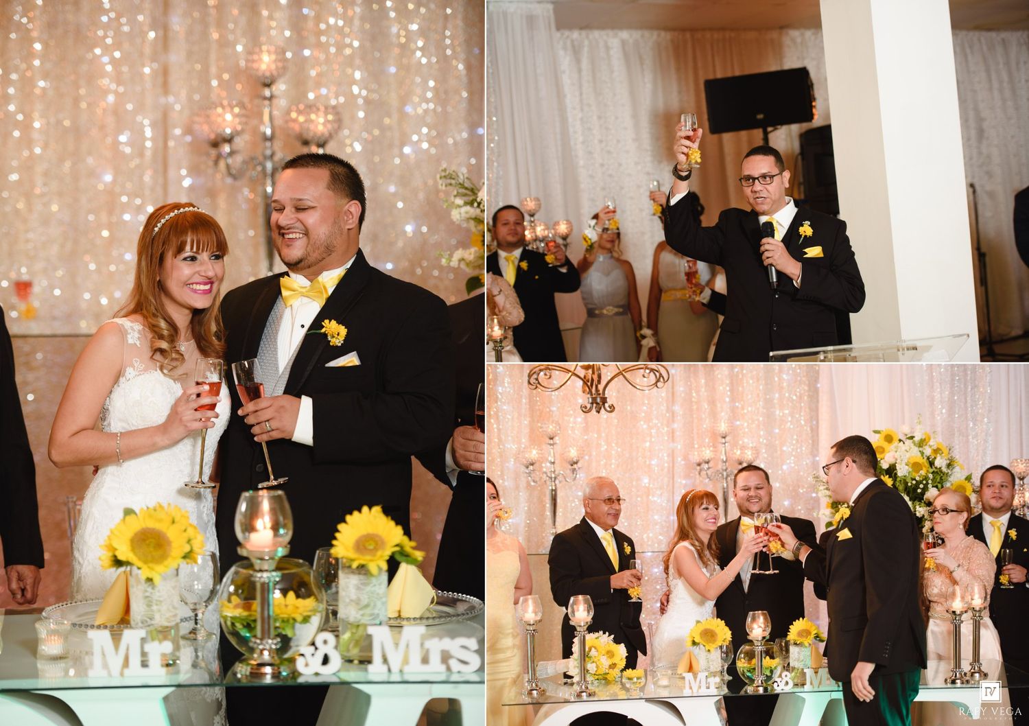 Bride and groom smile together at wedding reception with sunflower decorations and Mr. and Mrs. signs on table.