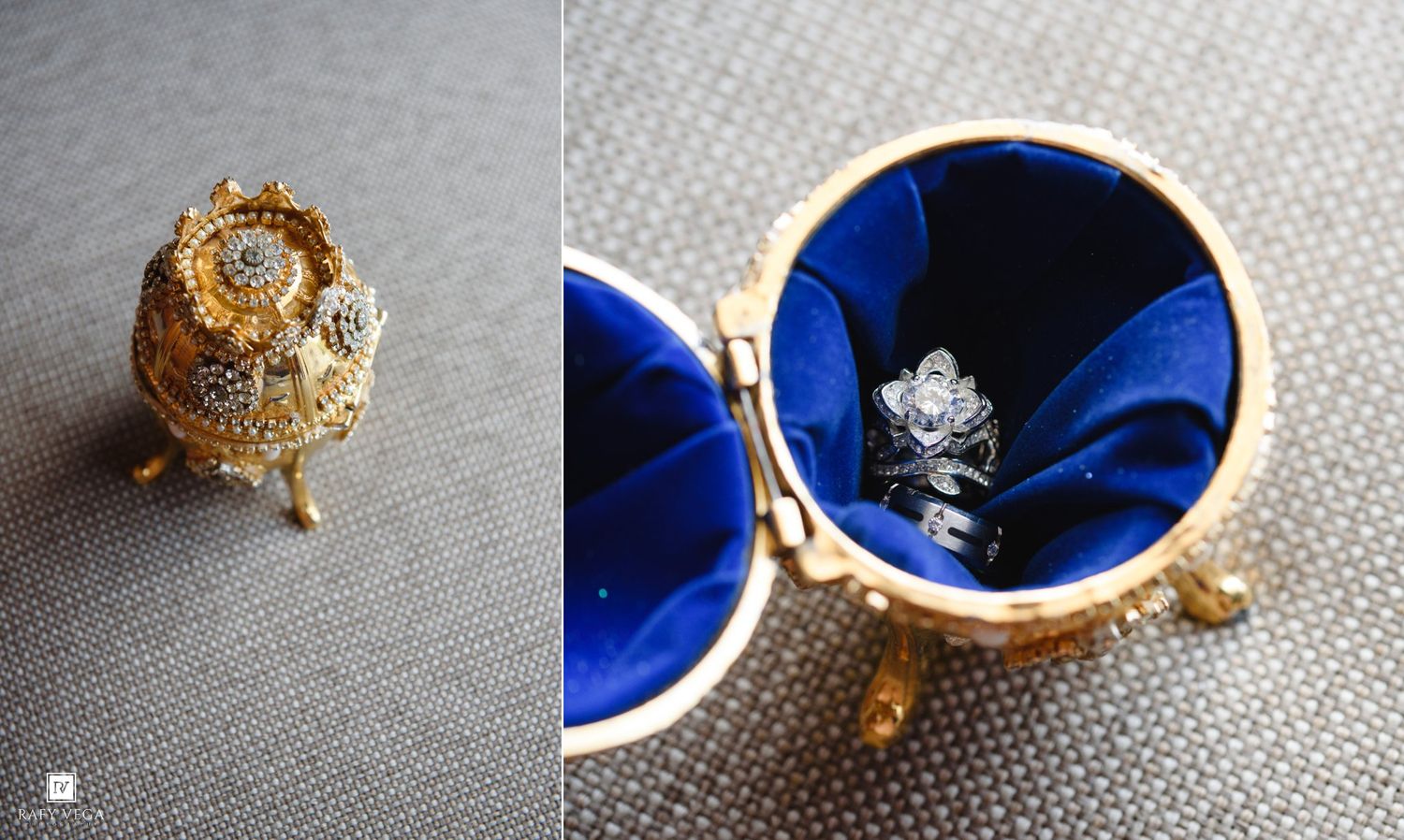 Gold Faberge-style egg jewelry box with blue satin interior displaying a diamond engagement ring.