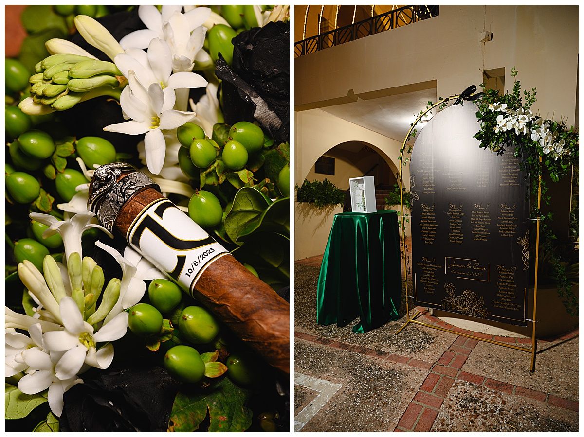 Elegant wedding cigar display with white tuberose flowers and green berries beside a dark seating chart sign.