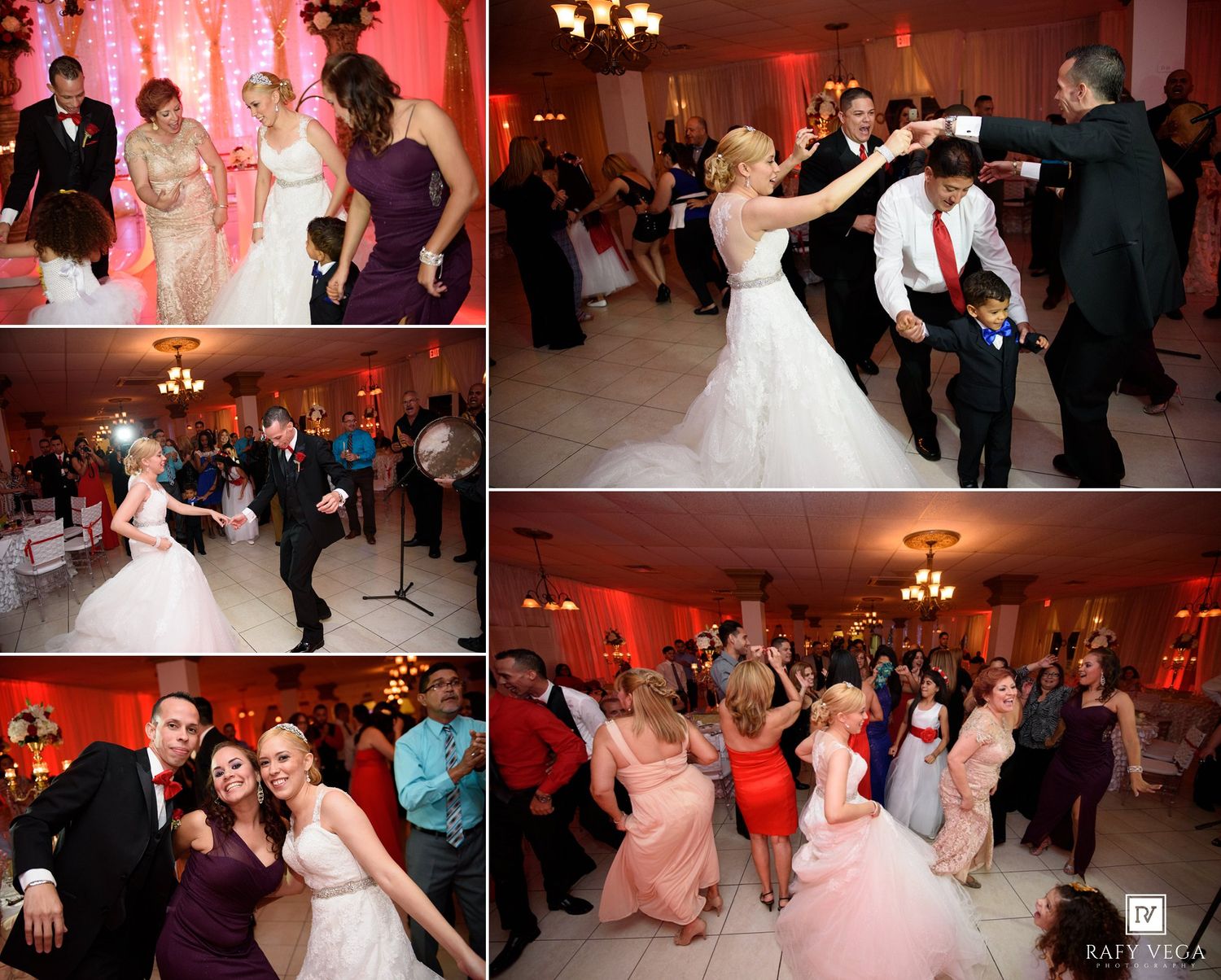 Wedding reception guests dancing joyfully on a decorated ballroom floor with red ambient lighting and elegant decor.