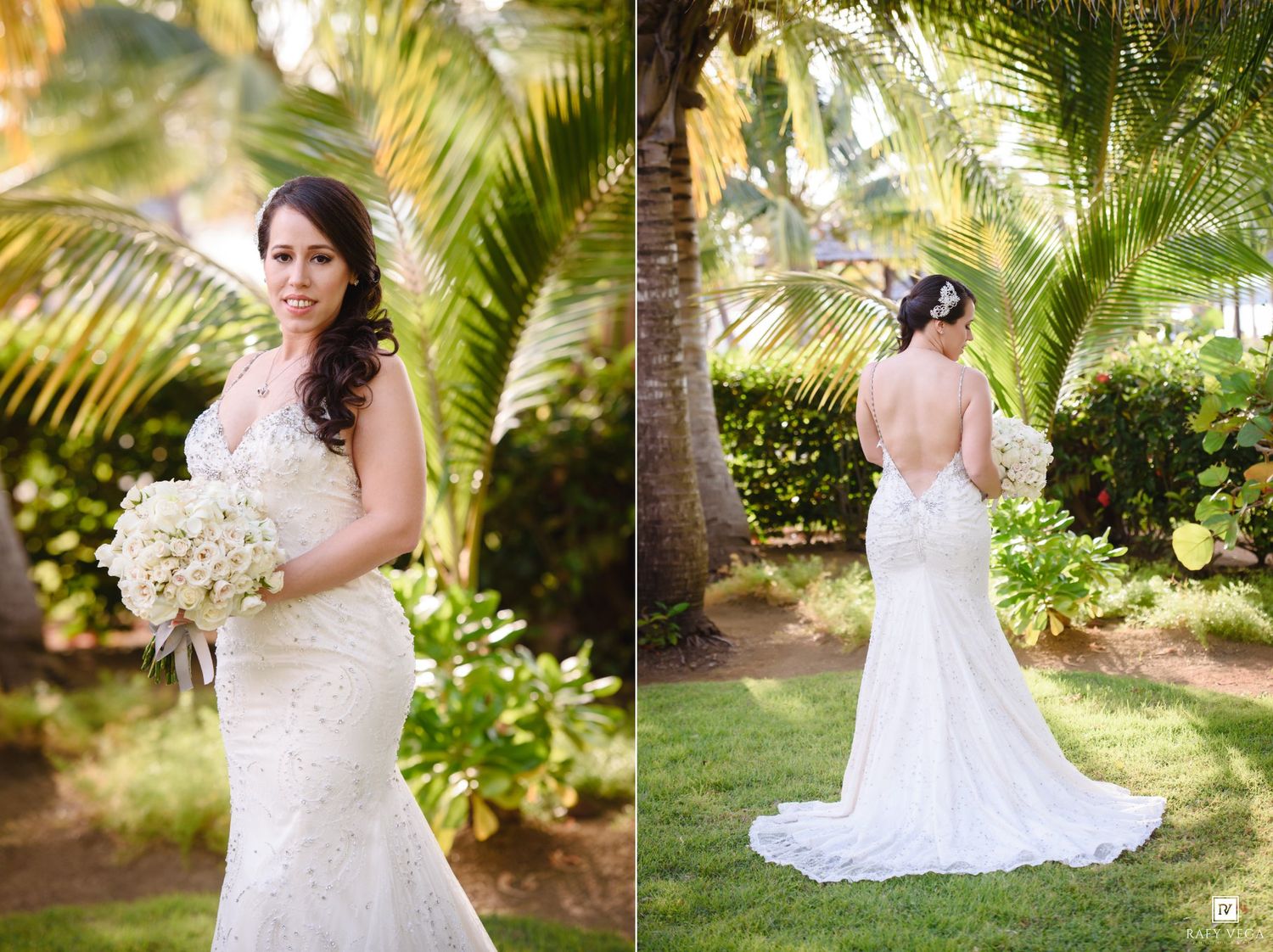 Bride in backless lace mermaid wedding gown holding white bouquet poses outdoors among tropical palm trees.