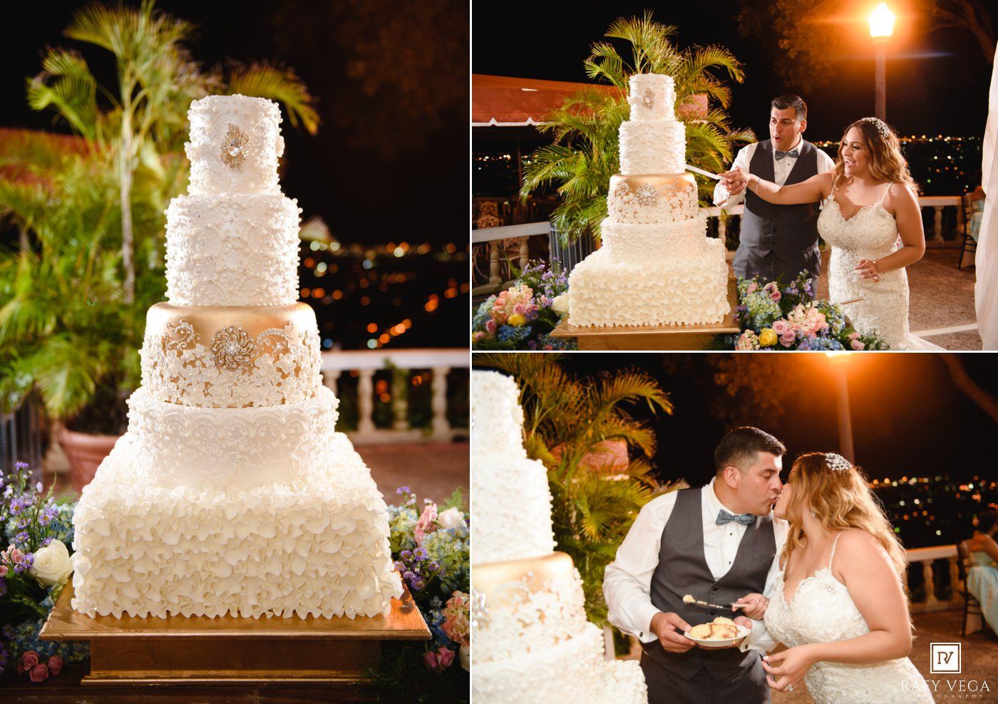 Couple cuts a tall white multi-tiered wedding cake at an outdoor night reception.