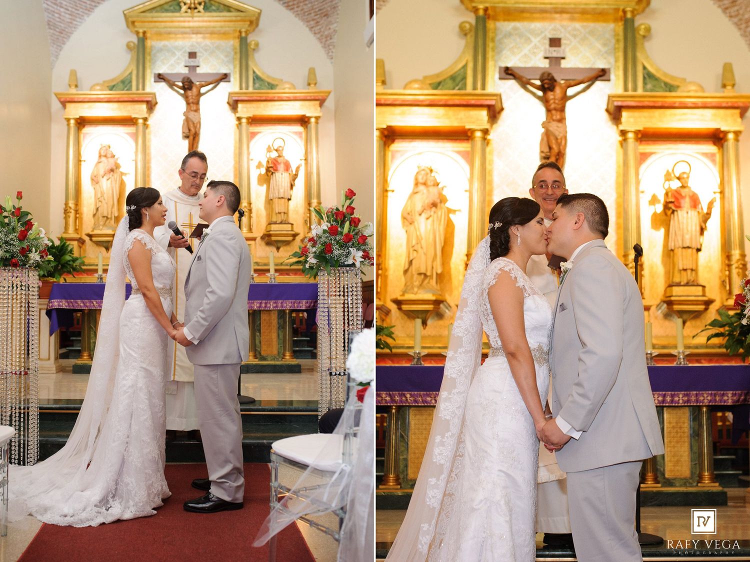 Bride and groom sharing a first kiss at the altar of an ornate Catholic church during their wedding.