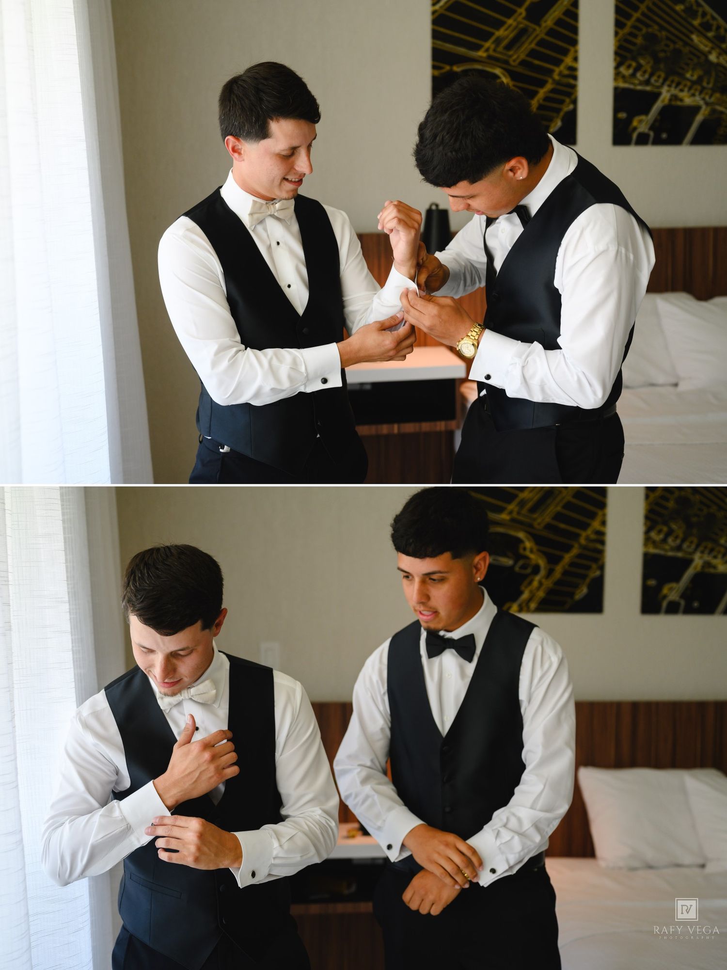 Two groomsmen in black vests and bow ties help each other with cufflinks while getting ready for a wedding.