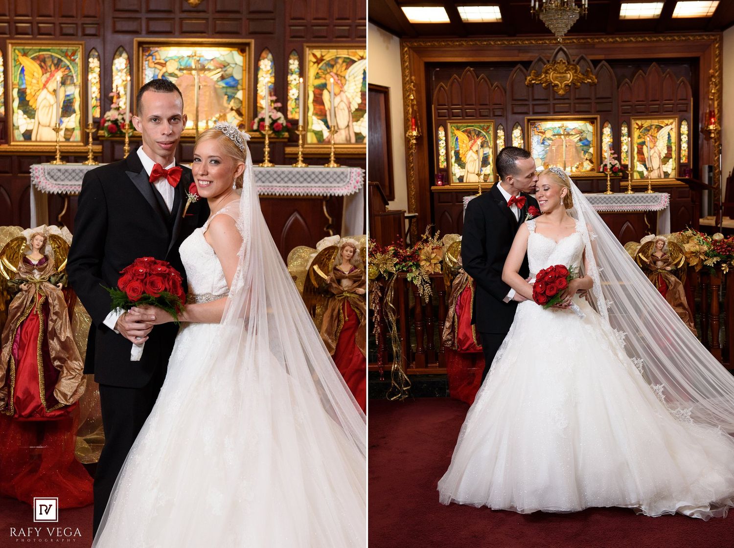 Bride and groom pose together in a church decorated with red flowers and ornate stained glass windows on their wedding day.
