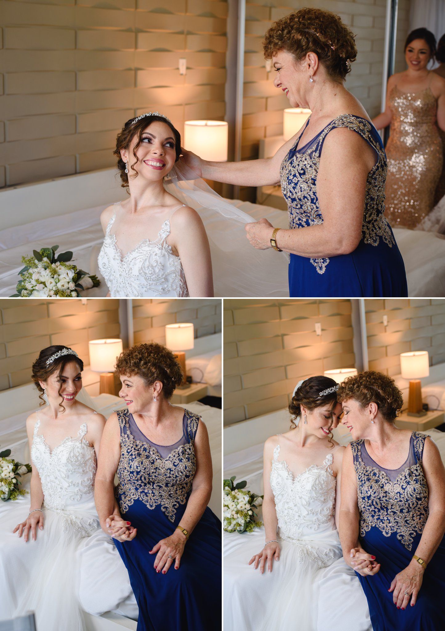 Bride in white gown smiles as older woman in blue dress adjusts her veil, then shares a tender moment together.