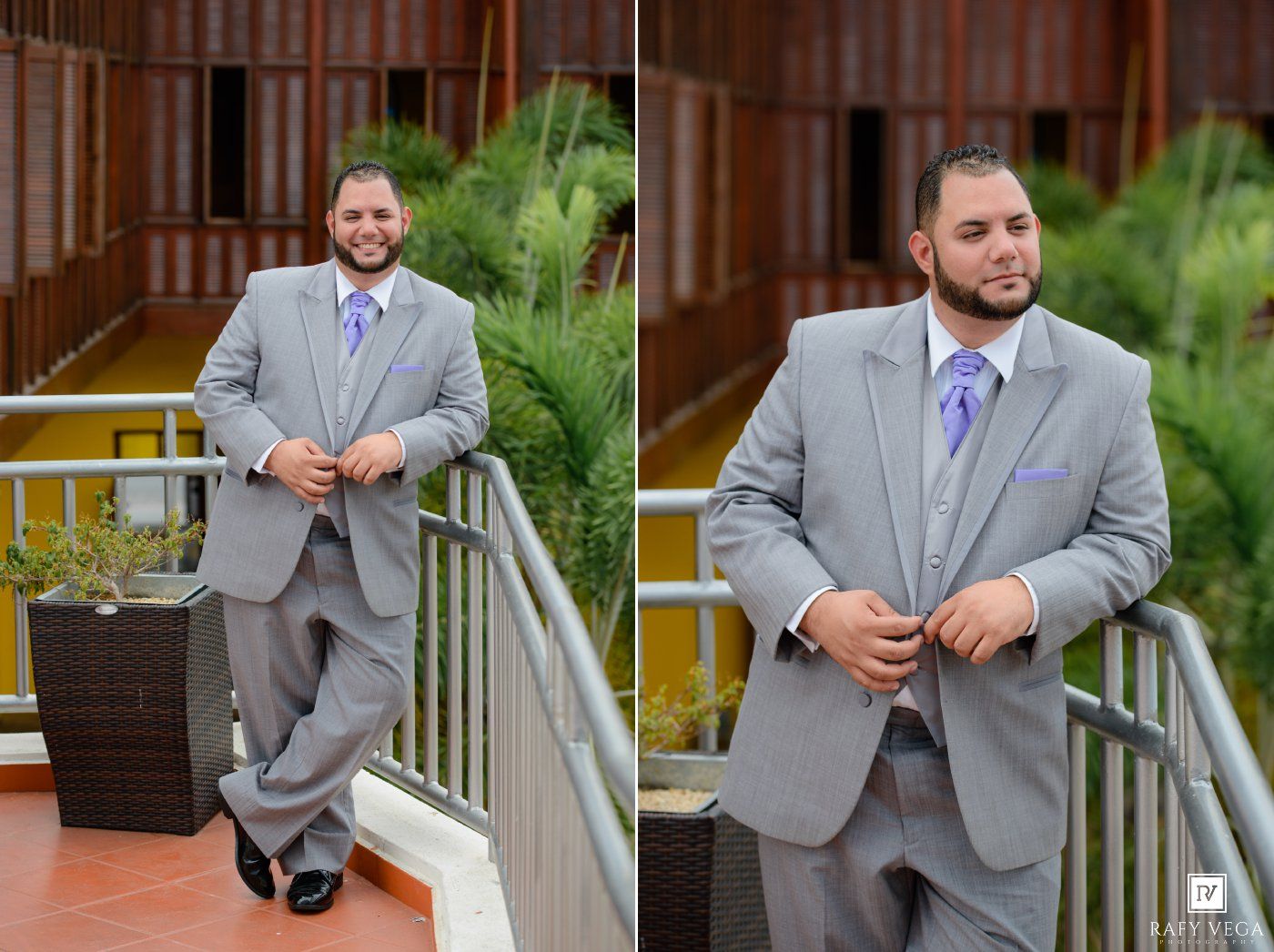 Groom in gray suit with lavender tie adjusting jacket on outdoor venue balcony with lush greenery backdrop.