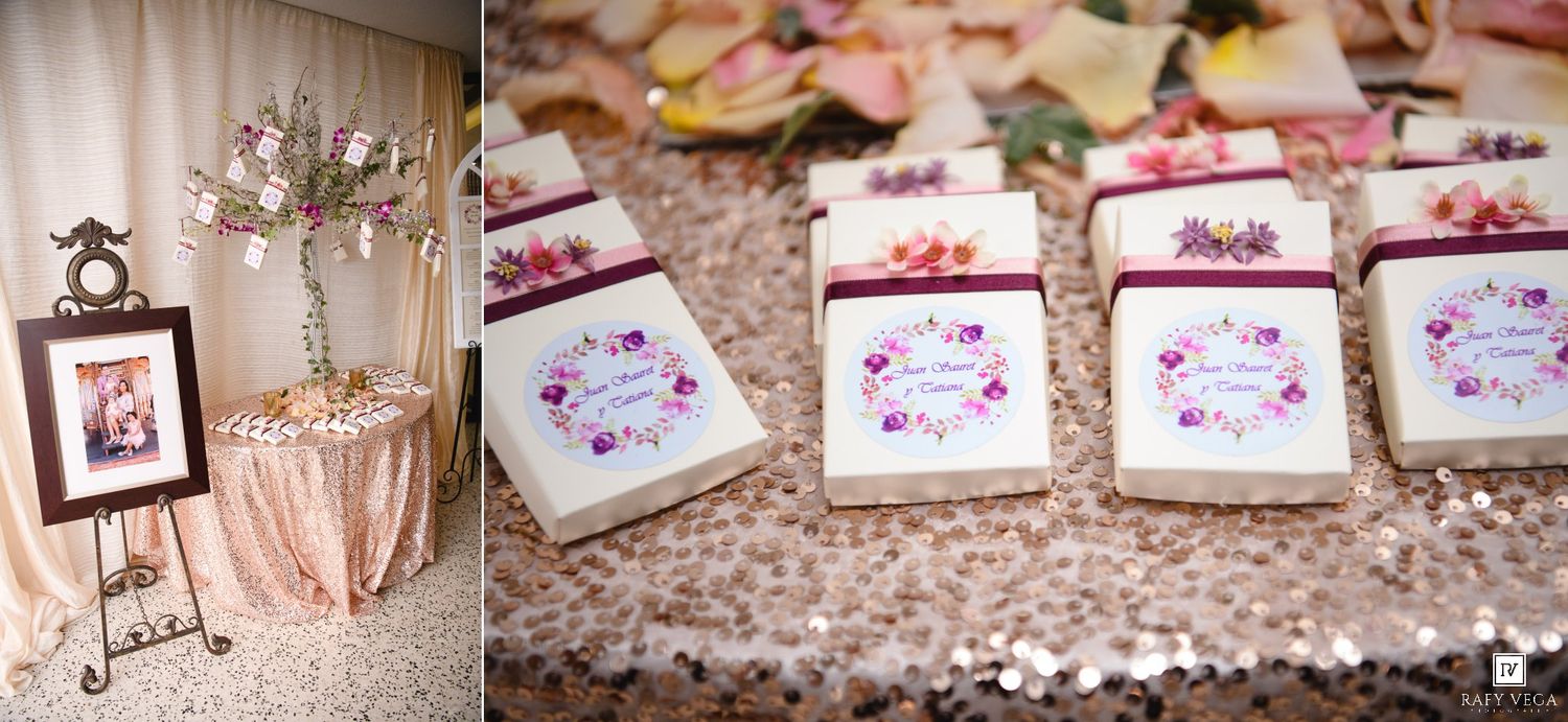 Elegant wedding reception table with floral decor and personalized cookie favors on a gold sequin tablecloth.