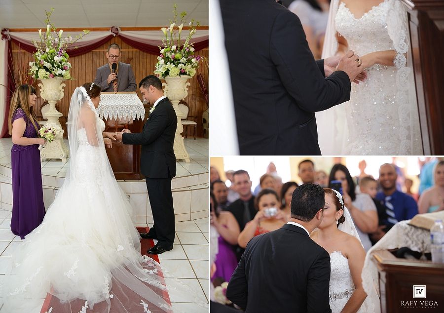 Bride and groom exchange vows at elegant church wedding ceremony with guests and officiant present.