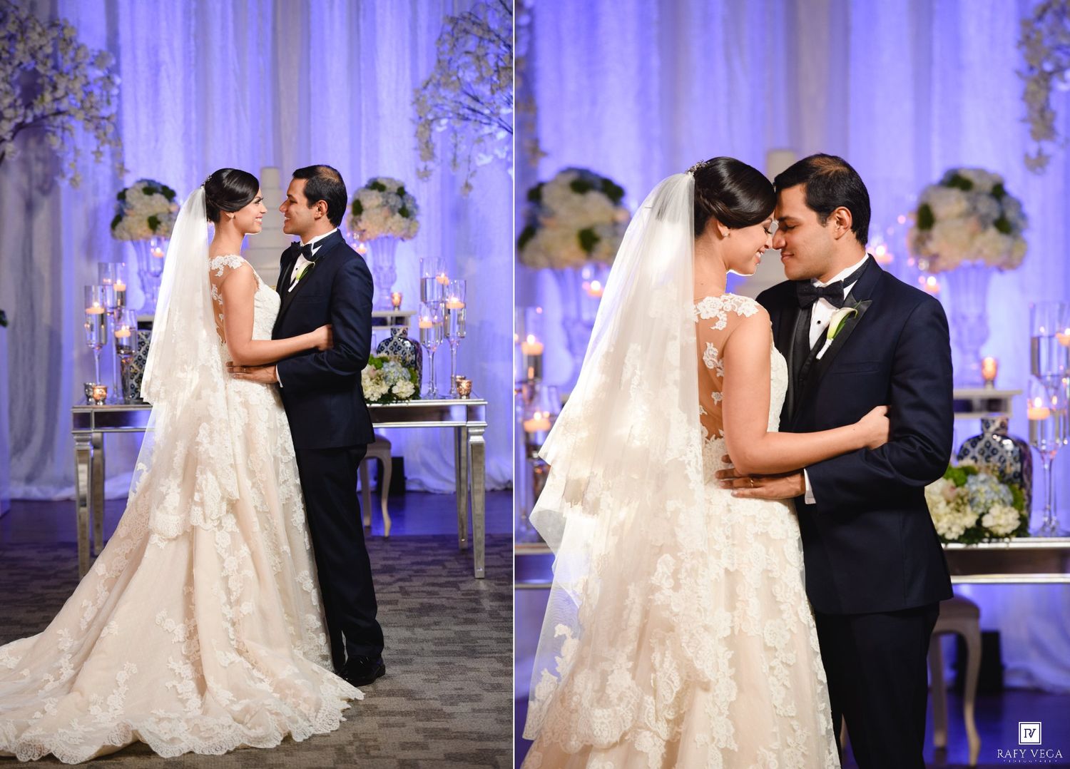 Bride in lace gown and groom in tuxedo share first dance at elegant candlelit wedding reception.