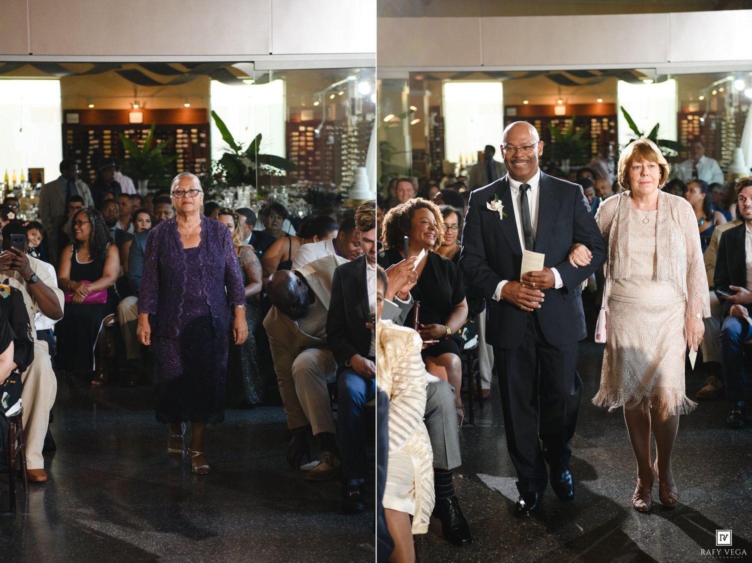 Wedding guests walking down the aisle during a ceremony in a elegant venue with seated attendees.