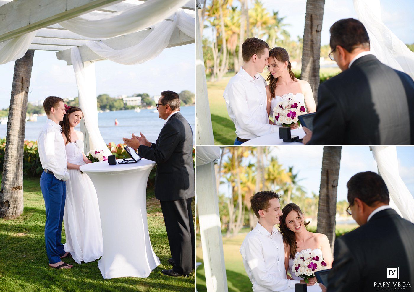Outdoor wedding ceremony under white canopy with couple exchanging vows near palm trees and waterfront.