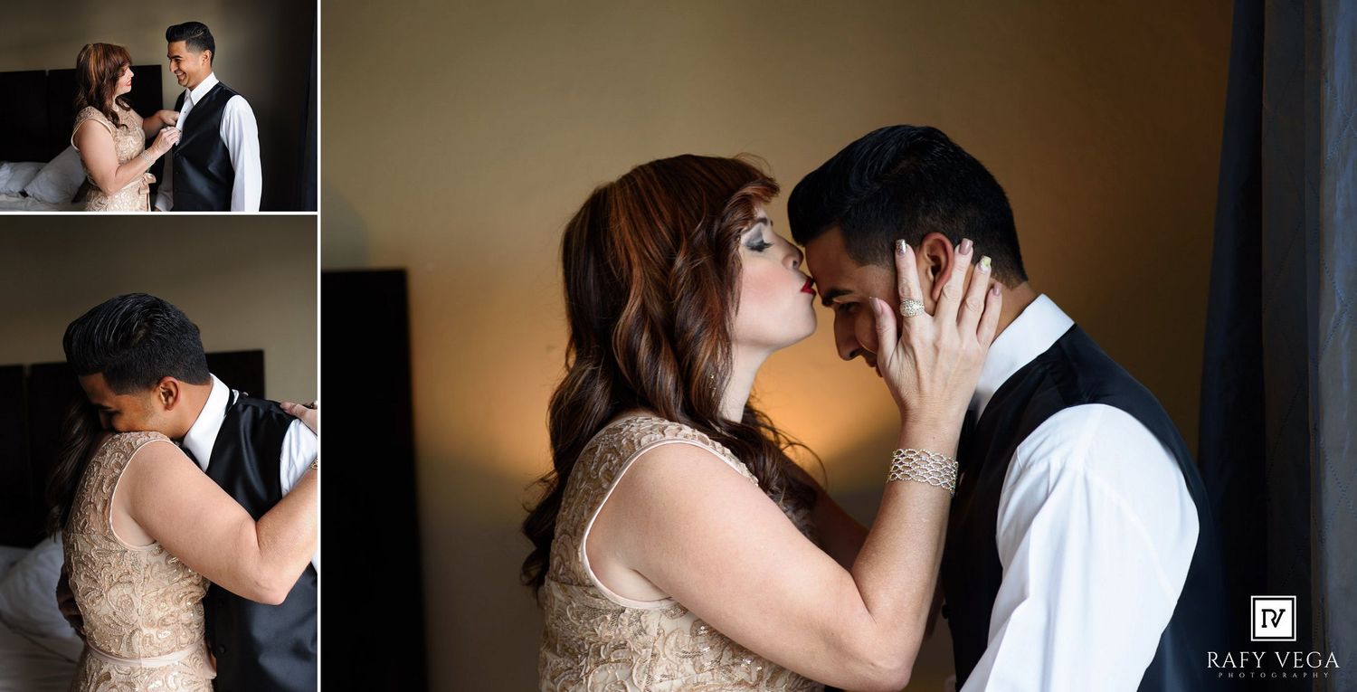 Romantic wedding couple sharing a tender kiss, with the groom in a vest helping the bride in a gold dress prepare.