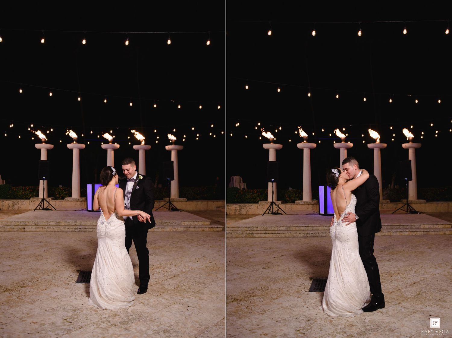 Bride and groom share their first dance outdoors at night surrounded by torches and string lights.