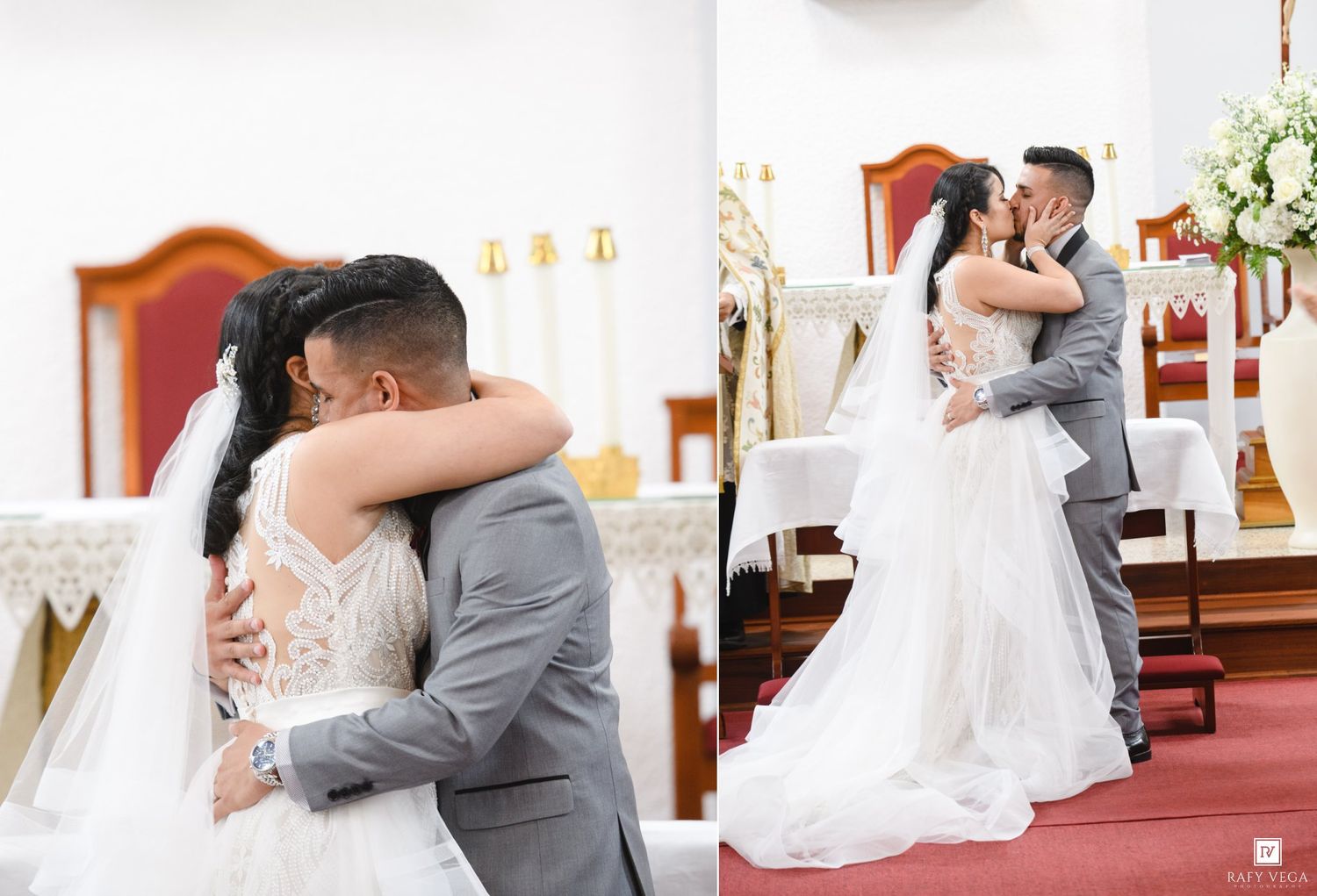 Bride and groom share their first kiss at the altar during a church wedding ceremony, dressed in white gown and gray suit.