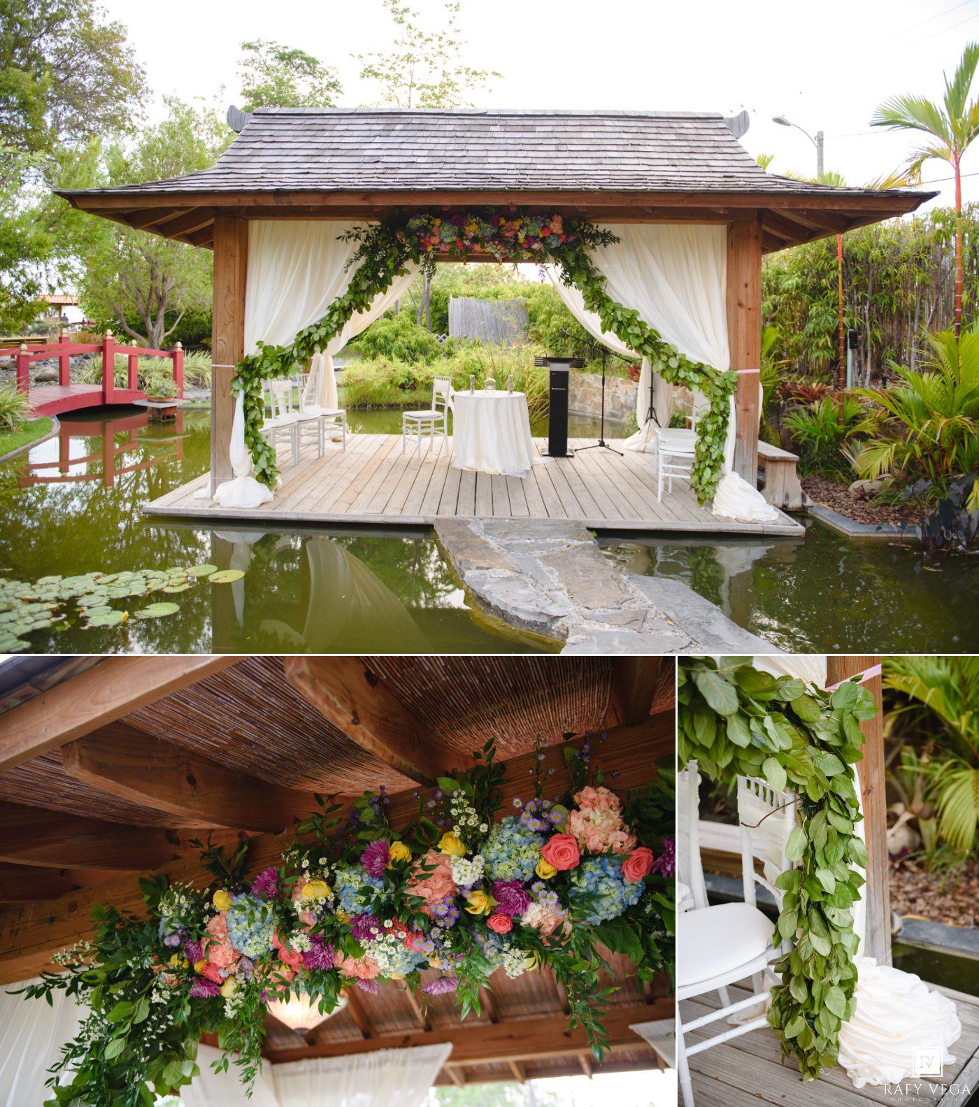 Elegant garden wedding gazebo over pond with floral arch, greenery, and colorful blooms in a lush tropical setting.