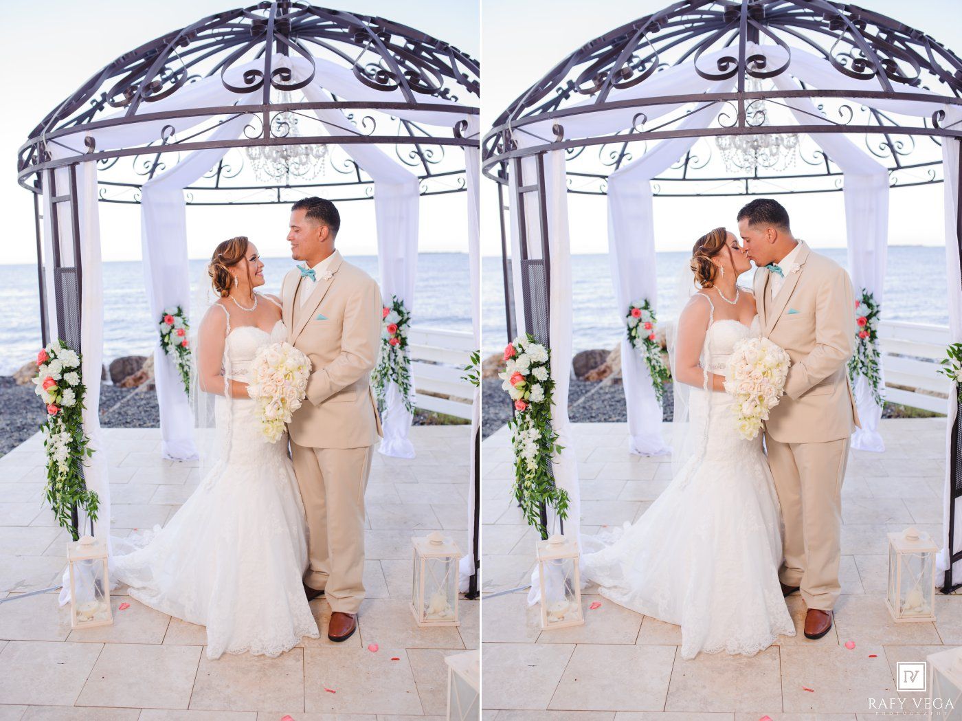 Bride and groom share a romantic kiss under an elegant gazebo by the ocean at their beachside wedding ceremony.