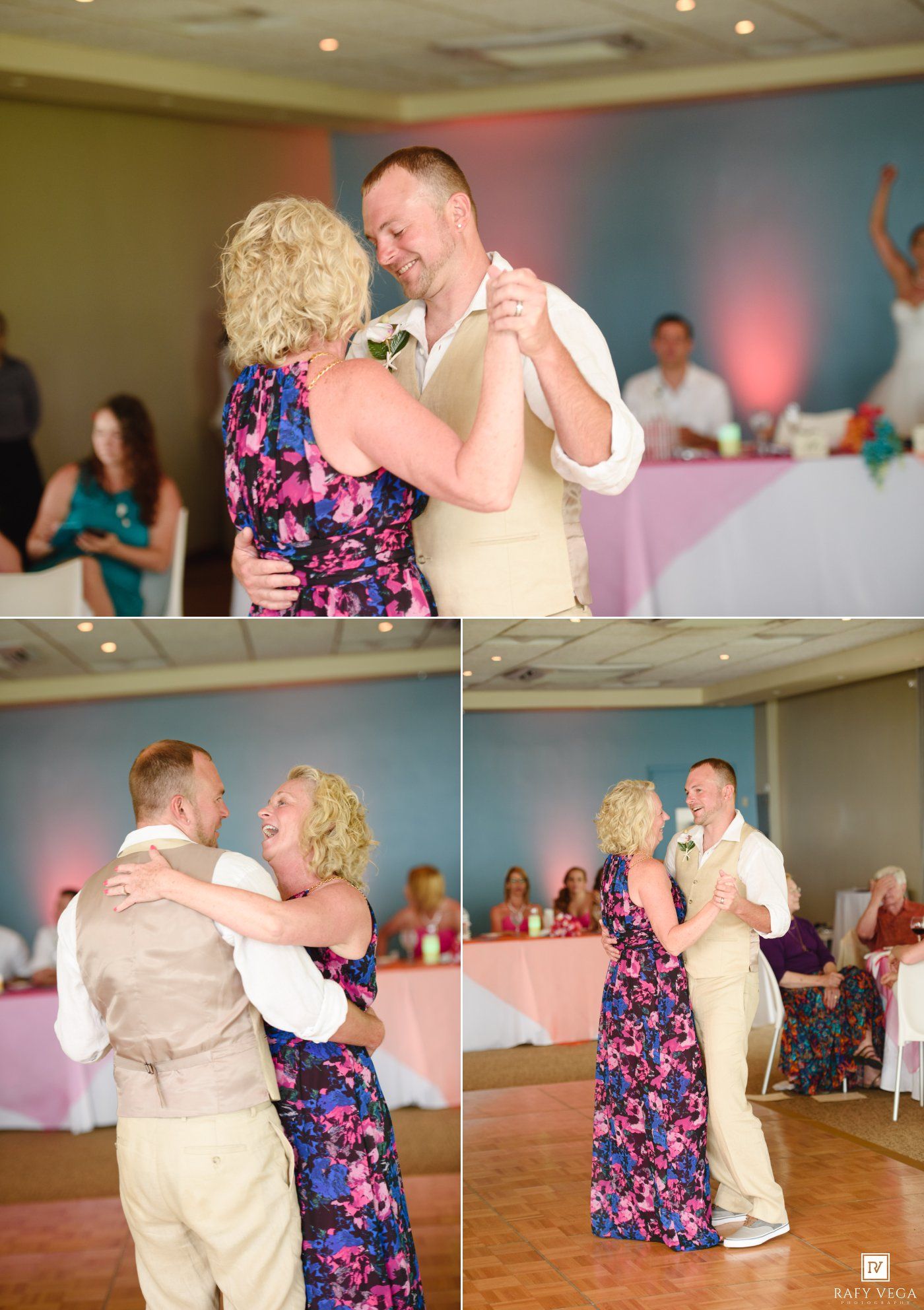 Groom and mother sharing a tender first dance at a wedding reception in a decorated ballroom.