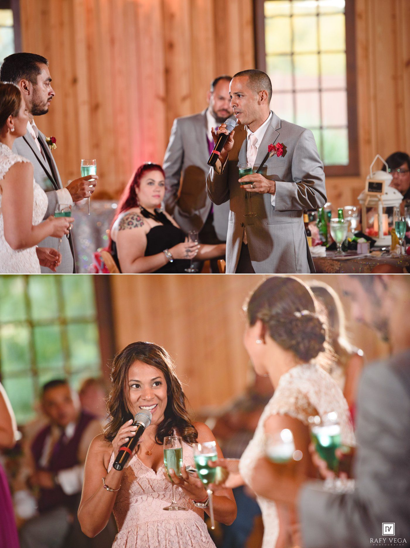 Wedding reception toasts in a rustic barn venue with guests raising glasses and smiling.