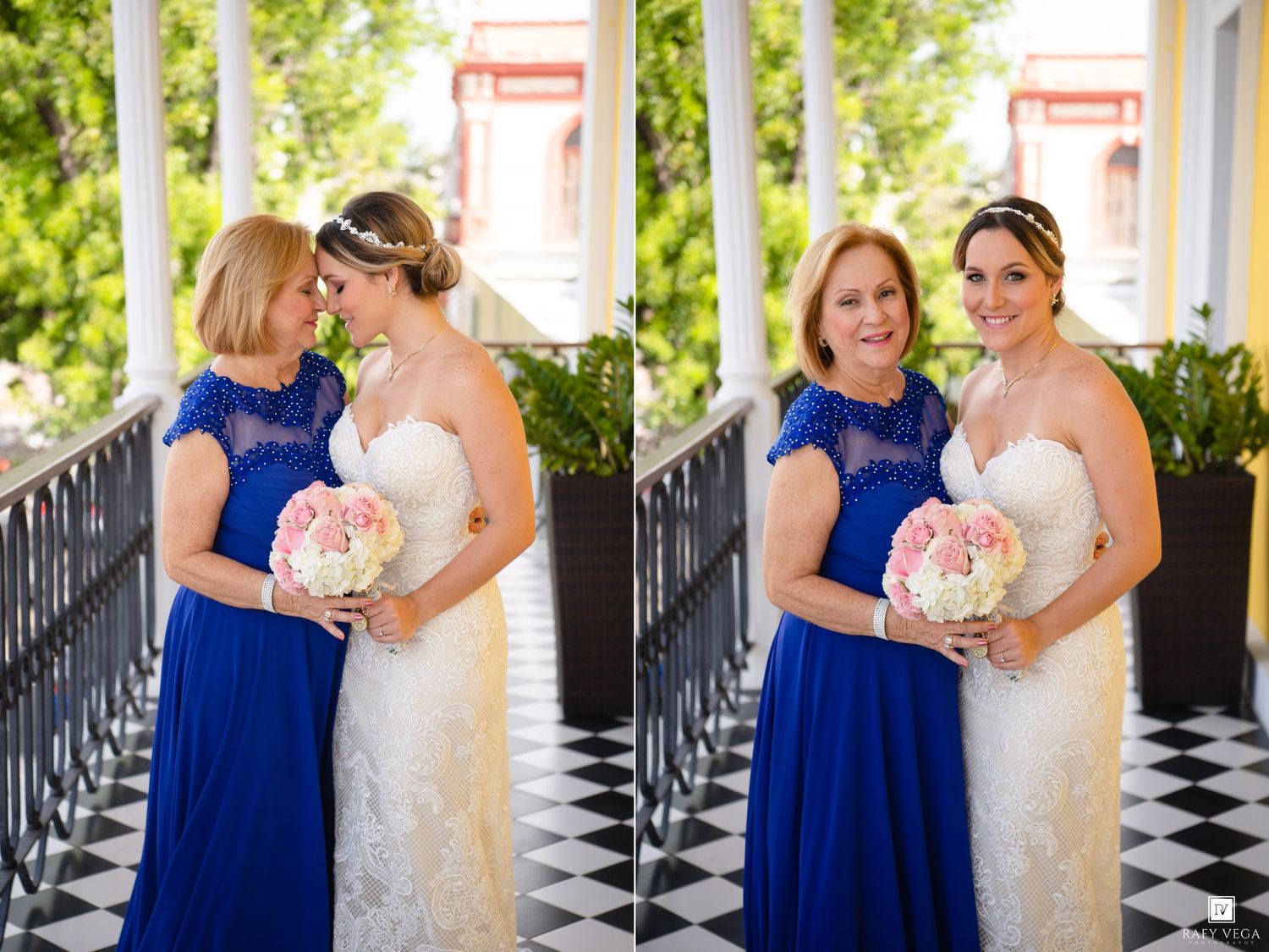 Bride in white gown holds pink bouquet beside woman in royal blue lace dress on checkered floor porch.
