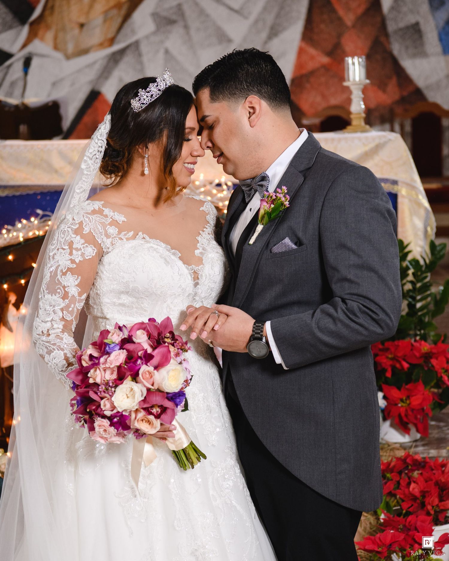 Bride and groom share intimate moment at altar, bride holding vibrant bouquet in church.